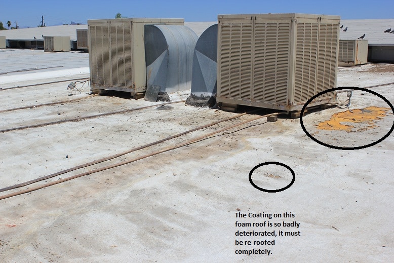 Example of a badly damaged foam roofing system