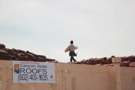 Canyon State Roofing applying commercial tile roofing.