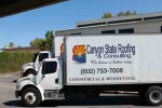 Picture of our truck delivering shingle roofing tiles in Arrowhead