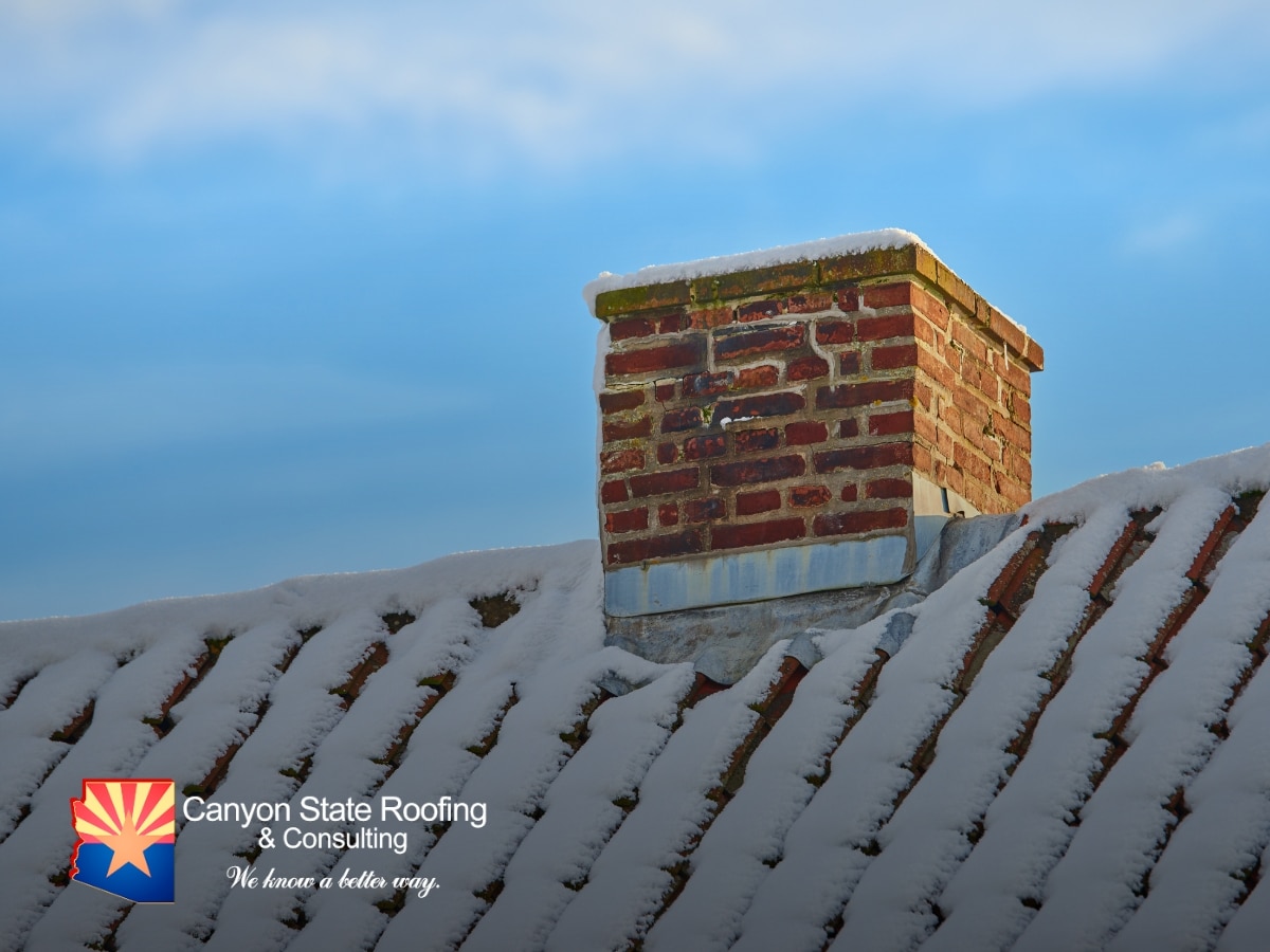 Frost on Arizona Roofs Around a Brick Chimney