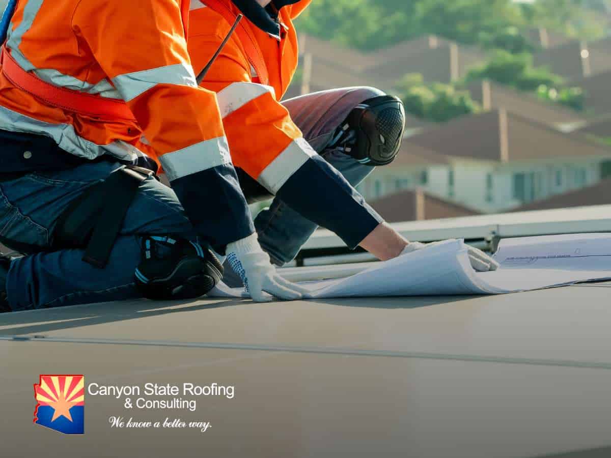 Roofing professionals conducting regular commercial roof inspections in Arizona